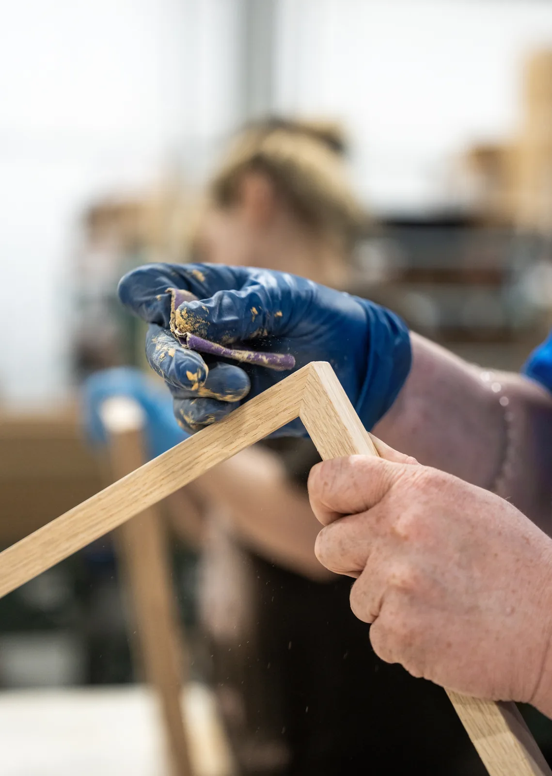 Finishing a wood frame by hand