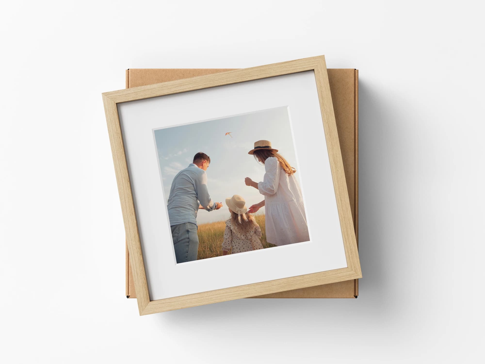 A framed family photograph with protective shipping packaging